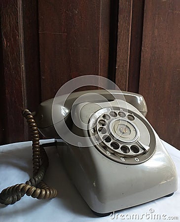 Rotary dial grey telephone Stock Photo