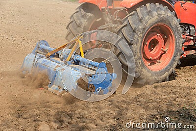 Rotary tiller tractor Stock Photo