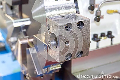 Rotating head in a high precision mechanics plant at CNC lathe Stock Photo