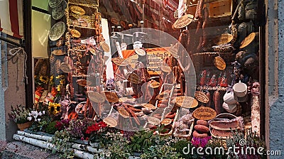 Rothenburg ob der Tauber, Germany - October 20, 2023: Amazing delicatessen window display with an assortment of Editorial Stock Photo