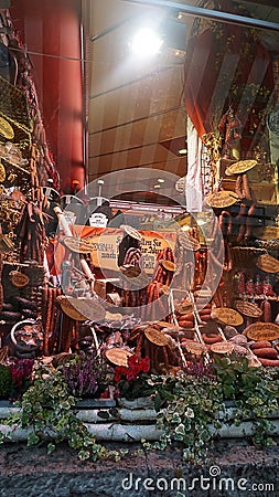 Rothenburg ob der Tauber, Germany - October 20, 2023: Amazing delicatessen window display with an assortment of Editorial Stock Photo