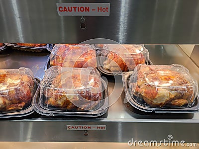 Rotisserie chickens for sale Stock Photo