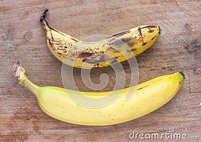 Rotten and fresh bananas Stock Photo