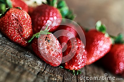 Rotten strawberries concept gmo Stock Photo