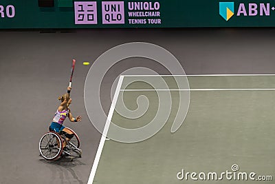 ROTTERDAM, 18 February 2023 - Diede de Groot, Dutch wheelchair tennis player serving for the championship at ABN AMRO Open 2023 Editorial Stock Photo