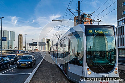 Urban scene, street with cars and a tram with skyscrapers in the background in Rotterdam, the Netherlands Editorial Stock Photo