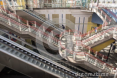 Interior stairs and escalators inside a large modern terminal building Editorial Stock Photo