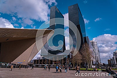 Huge skyscrapers in Rotterdam. Gebouw Delftse Poort a tall glassy building next to the central railway station Editorial Stock Photo