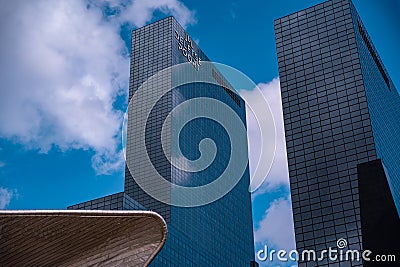 Huge skyscrapers in Rotterdam. Gebouw Delftse Poort a tall glassy building next to the central railway station Editorial Stock Photo