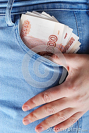 Rouble in jeans pocket Stock Photo