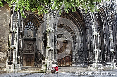 Rouen: Saint-Maclou church and bicycle Stock Photo