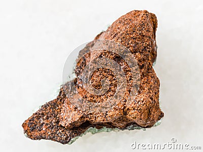 rough bog iron ore ( limonite) stone on white Stock Photo