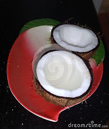 Rough coconut broken half pieces Stock Photo
