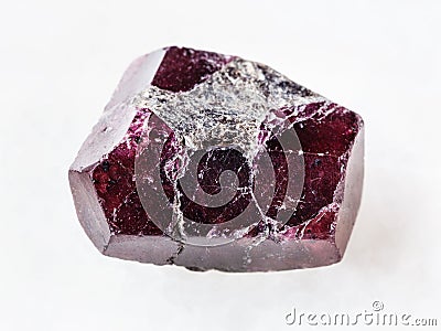 rough crystal of red garnet gemstone on white Stock Photo