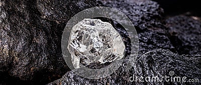 Rough diamond precious stone in mines. Concept of mining and extraction of rare ores Stock Photo