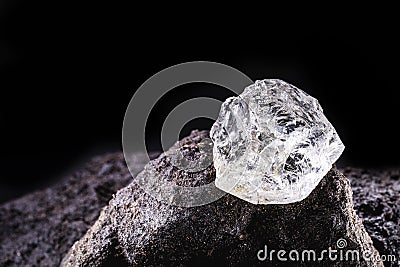 Rough diamond uncut gemstone mine bottom. Concept of mining and extraction of rare ores Stock Photo