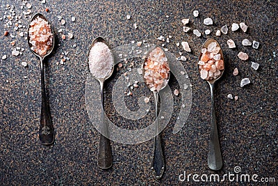 Rough and fine pink Himalayan sea salt on vintage spoons Stock Photo