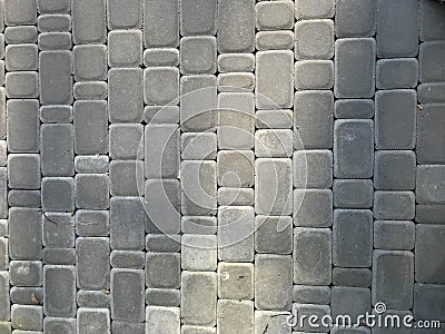 Rough grunge urban gray background of stone square paving slabs Stock Photo