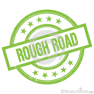 ROUGH ROAD text written on green vintage stamp Stock Photo