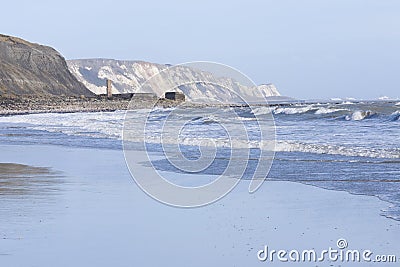 Rough see and white waves at Folkestone beach Stock Photo