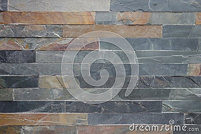 Rough stone cladding tiled wall Stock Photo