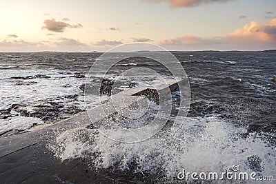 Rough stone coast line, West coast of Ireland, Sligo. Strong powerful wave hist the rocks. Atlantic ocean Stock Photo