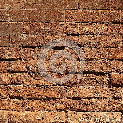 Rough textured clay brick wall Stock Photo