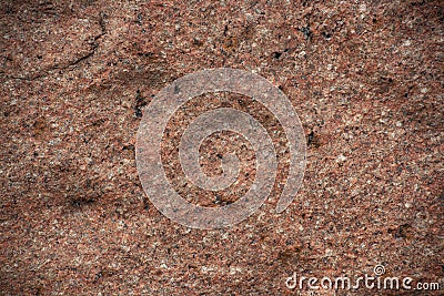 Rough uneven red stone wall Stock Photo