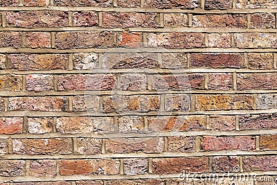 Rough and worn red brick wall Stock Photo