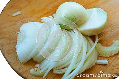 Cut onion, roughly chopped, halves and cubes, peel the onion from the husk Stock Photo