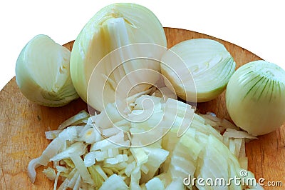 Cut onion, roughly chopped, halves and cubes, peel the onion from the husk Stock Photo