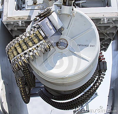 Round of ammunition loaded into .50-caliber machine gun on US Navy destroyer during Fleet Week 2012 Editorial Stock Photo