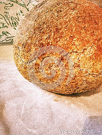 Round baked bread on white cloth round baked bread on white cloth,homemade bread with integral flour Stock Photo