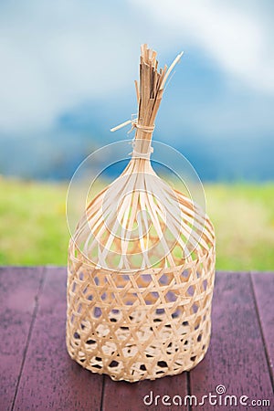 Round bamboo basket on the table Stock Photo