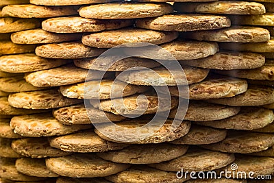 Round biscuits arranged in stack Stock Photo