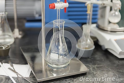 Round bottom flask and Burette clamp Stock Photo