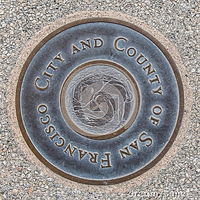 Round bronze plaque in Exploratorium Editorial Stock Photo