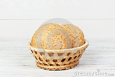 Round buns with seeds. Bread in the basket. Freshly baked bread rolls with seed Stock Photo