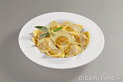 Round dish with a portion of pumpkin tortelli pasta Stock Photo