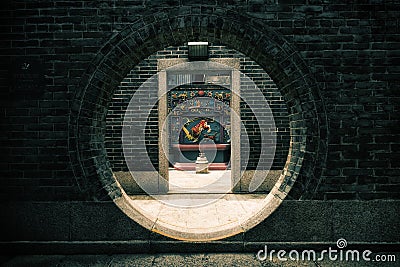 Round doorway at the Pak Tai Temple on Cheung Chau Island in Hong Kong, China Stock Photo