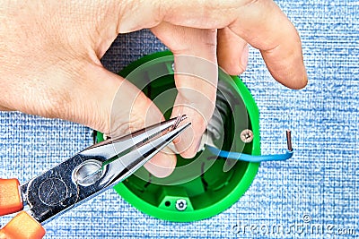 Round electrical box during installation Stock Photo