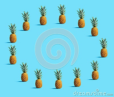 Round frame of pineapples Stock Photo