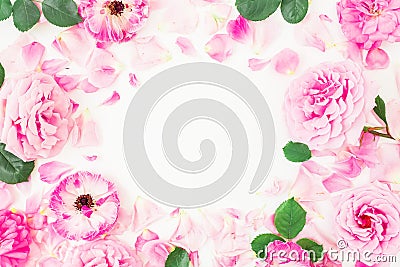 Round frame of pink ranunculus flowers, roses, petals and leaves on white background. Floral lifestyle composition. Flat lay, top Stock Photo