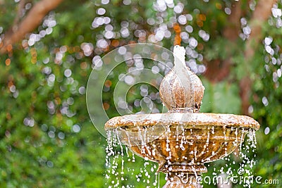 Round garden water fountain tiered Stock Photo