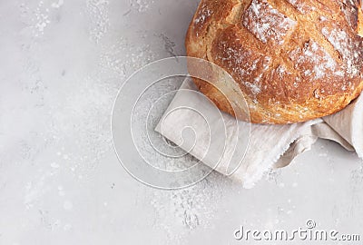 Round loaf of freshly backed artisan sourdough bread. No knead bread. Stock Photo