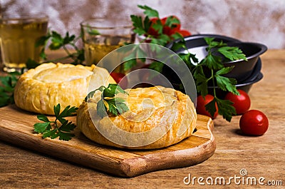 Round meat pie with vegetables Stock Photo