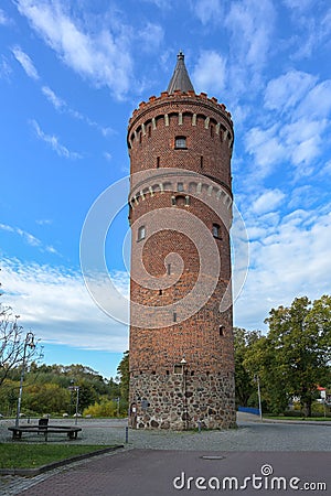 Round medieval fortified tower built of brick in Friedland Mecklenburg-Vorpommern called Fangelturm, formerly part of the city Stock Photo