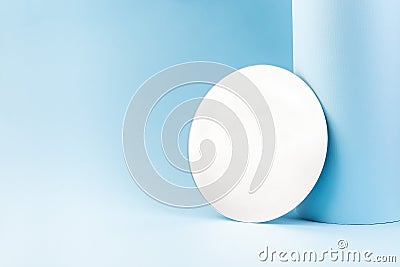 Round mirror on a blue paper, trendy minimalistic background, horizontal, copy space Stock Photo