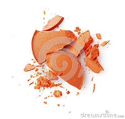 Round orange crashed eyeshadows for make up as sample of cosmetics product Stock Photo