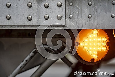 Turn on arrow on orange round marker turn signal on cargo dry va Stock Photo